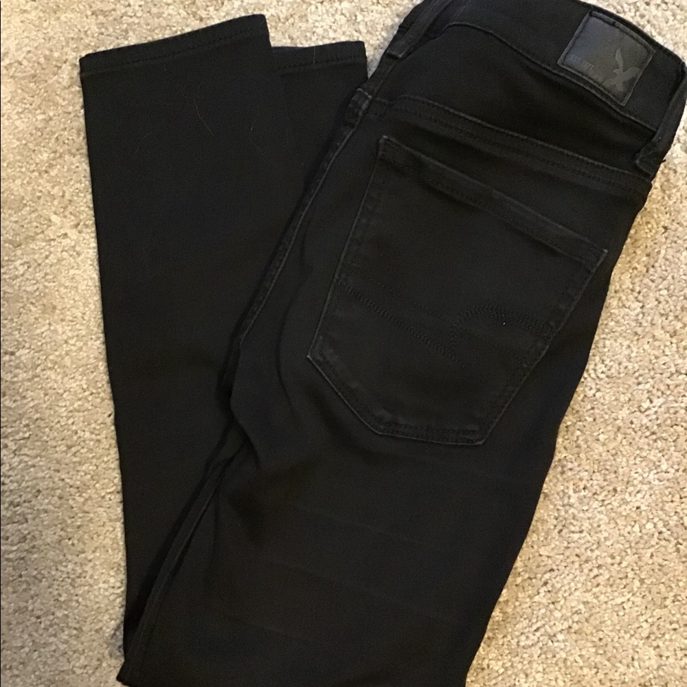 Black cropped skinny jeans